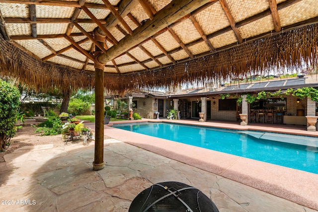swimming pool with a patio