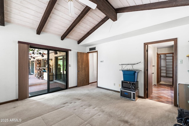 unfurnished living room with carpet flooring, wooden ceiling, and baseboards