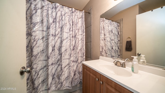 bathroom with vanity and a shower with curtain