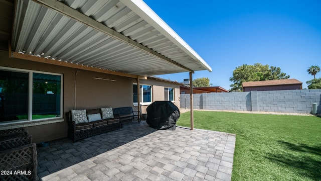 view of patio with a grill