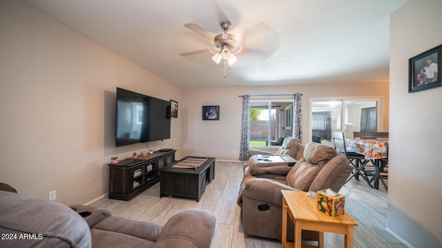 living room featuring ceiling fan