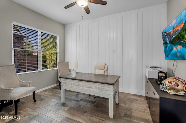 office with baseboards, ceiling fan, and wood finished floors