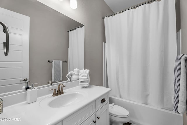 full bathroom with vanity, toilet, and shower / bath combination with curtain