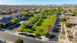 drone / aerial view with a residential view and a mountain view