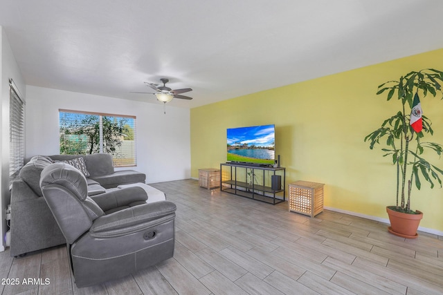 living room featuring ceiling fan