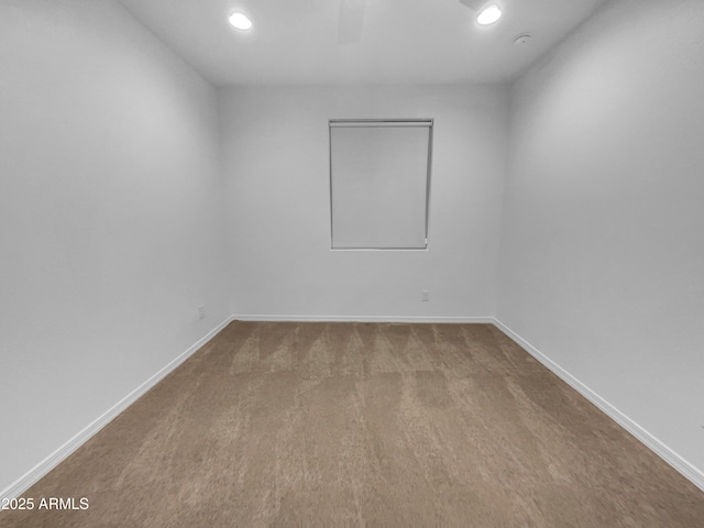 empty room with recessed lighting, baseboards, and carpet floors