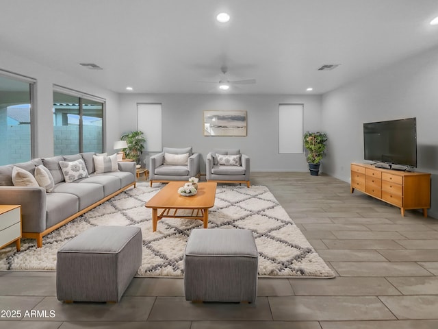 living area featuring recessed lighting, visible vents, wood finished floors, and a ceiling fan