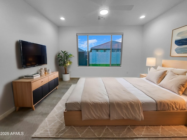 carpeted bedroom featuring a ceiling fan, recessed lighting, visible vents, and baseboards