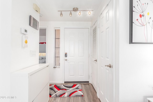 entryway featuring light wood finished floors