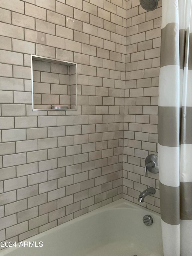 bathroom featuring shower / tub combo