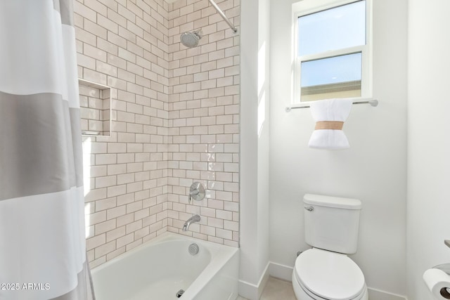 bathroom with toilet and shower / bath combo with shower curtain