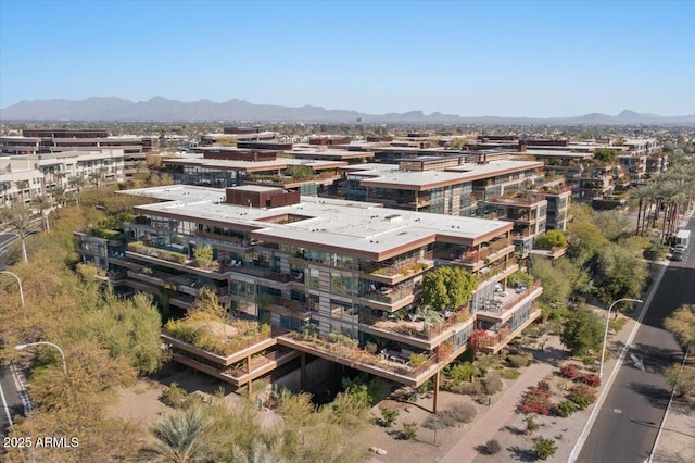 drone / aerial view featuring a mountain view