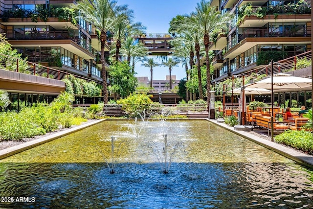 view of home's community featuring a water view