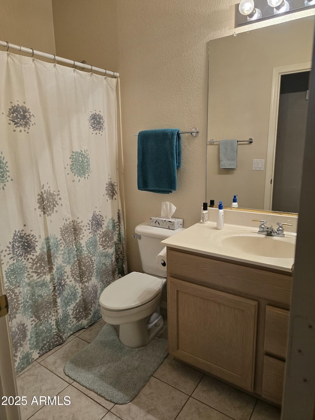 17821 N Woodrose Ave, Surprise, AZ 85374 - full bath with a shower with shower curtain, vanity, toilet, and tile patterned floors