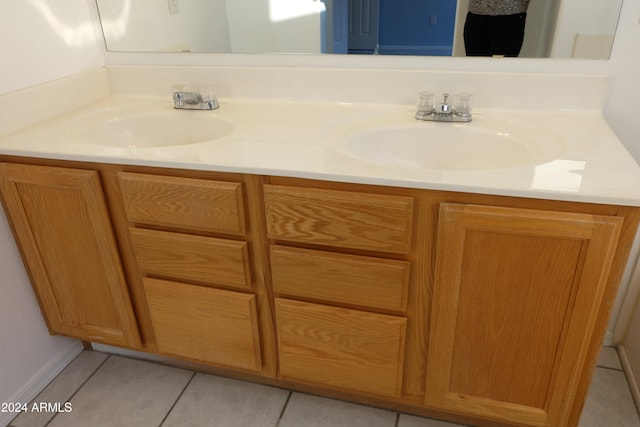 bathroom with vanity and tile patterned floors