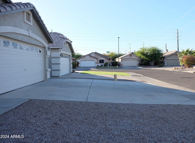 view of yard with a garage