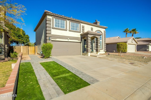 mediterranean / spanish-style house featuring a garage