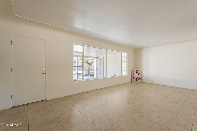 view of tiled spare room