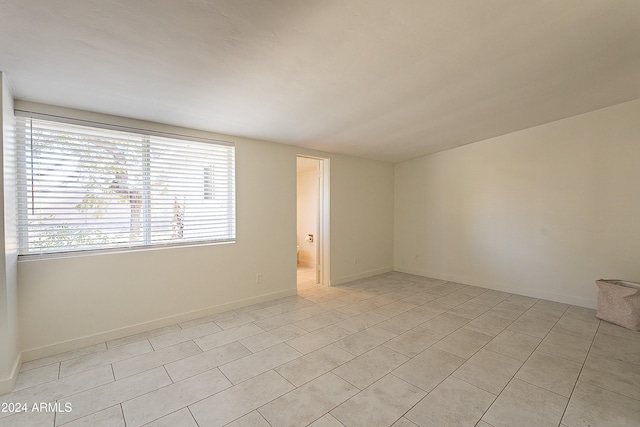 view of tiled spare room