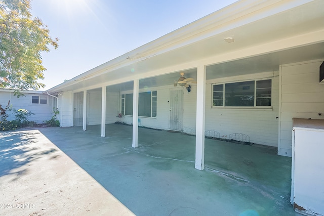 view of patio featuring ceiling fan