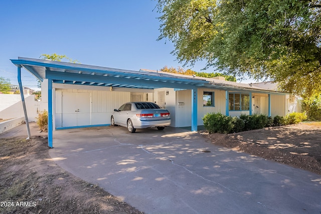 view of front of house with a carport