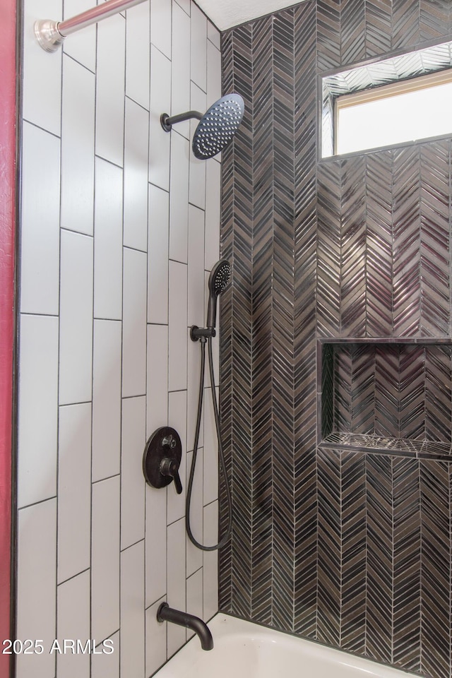 full bath with tiled shower