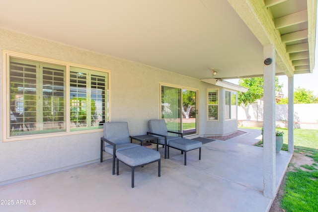 view of patio / terrace featuring fence