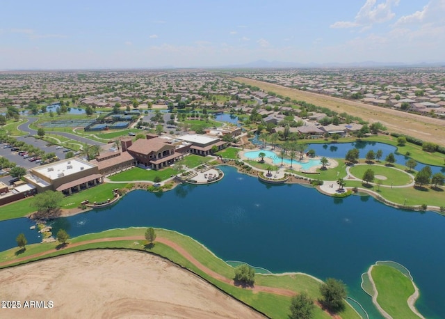 bird's eye view featuring a residential view and a water view