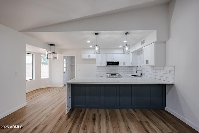 619 N Norfolk, Mesa, AZ 85205 - kitchen featuring appliances with stainless steel finishes, a sink, light stone countertops, baseboards, and recessed lighting