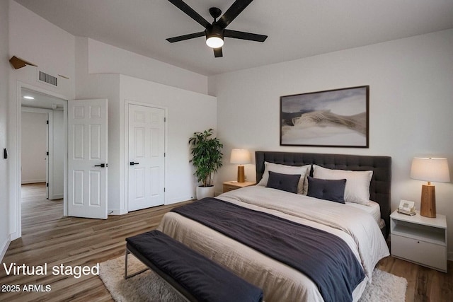 619 N Norfolk, Mesa, AZ 85205 - bedroom with wood finished floors, baseboards, and ceiling fan