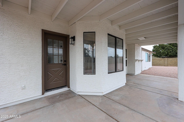 619 N Norfolk, Mesa, AZ 85205 - view of exterior entry featuring stucco siding and a patio area
