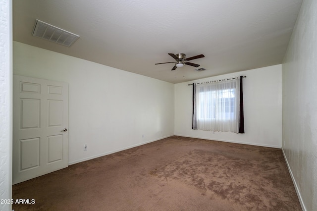 carpeted empty room with ceiling fan