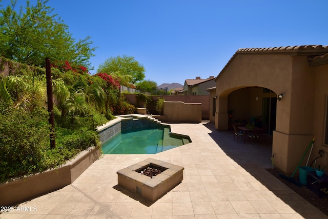 9842 E Celtic Dr, Scottsdale, AZ 85260 - view of pool with a fire pit, a patio, and a fenced backyard