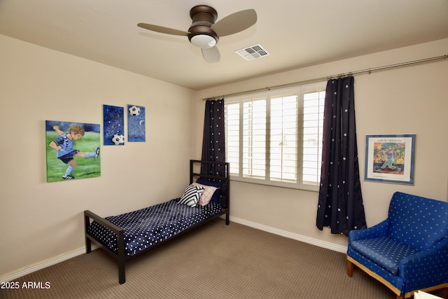 9842 E Celtic Dr, Scottsdale, AZ 85260 - carpeted bedroom featuring baseboards and a ceiling fan