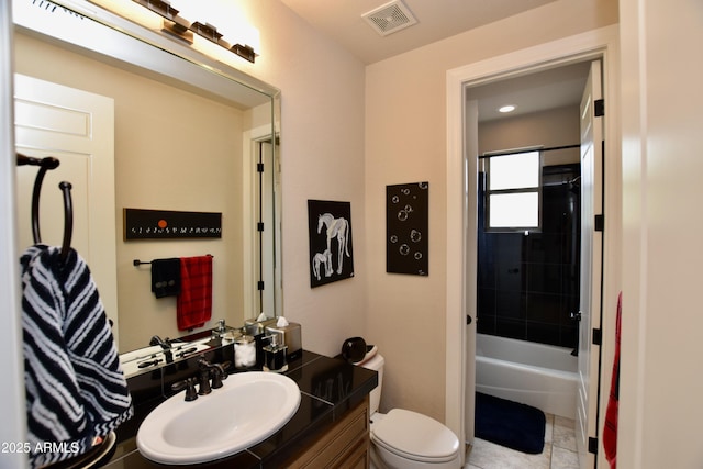 9842 E Celtic Dr, Scottsdale, AZ 85260 - full bath with toilet, vanity, tile patterned flooring, washtub / shower combination, and recessed lighting