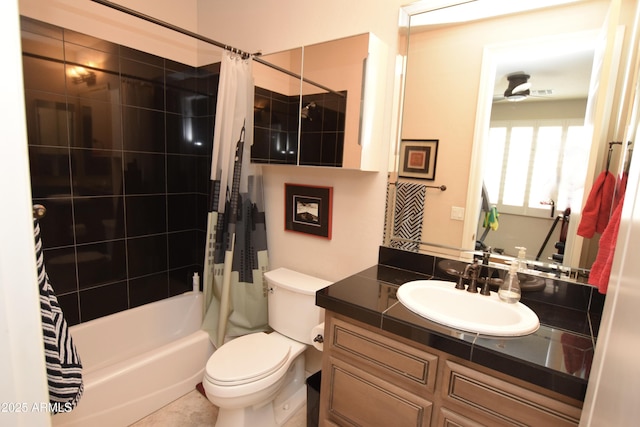 9842 E Celtic Dr, Scottsdale, AZ 85260 - full bath with ceiling fan, shower / bathtub combination with curtain, toilet, and vanity