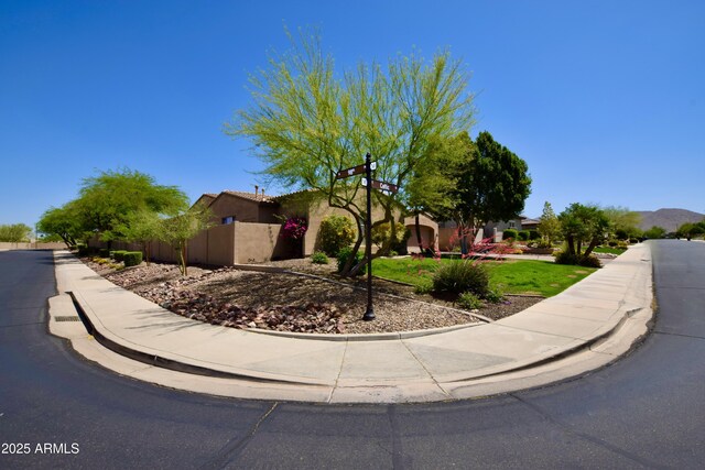 9842 E Celtic Dr, Scottsdale, AZ 85260 - view of side of home with fence and stucco siding
