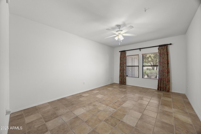 19700 N 76th St Unit 1103, Scottsdale, AZ 85255 - unfurnished room with a ceiling fan and light stone finish flooring