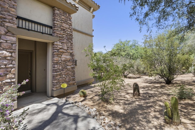 19700 N 76th St Unit 1103, Scottsdale, AZ 85255 - entrance to property with stone siding and stucco siding