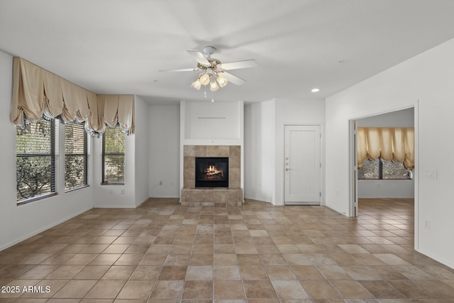 19700 N 76th St Unit 1103, Scottsdale, AZ 85255 - unfurnished living room with a ceiling fan, a tile fireplace, and recessed lighting