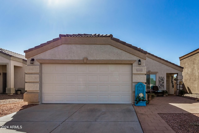 view of front of home with a garage