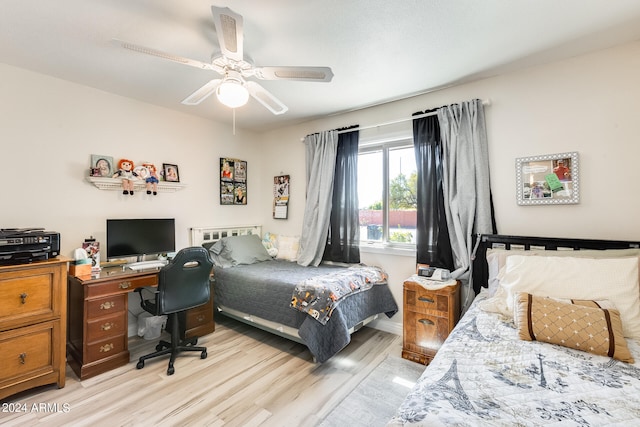 bedroom featuring ceiling fan and light wood-type flooring