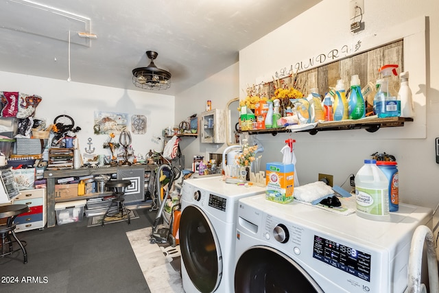 clothes washing area featuring separate washer and dryer