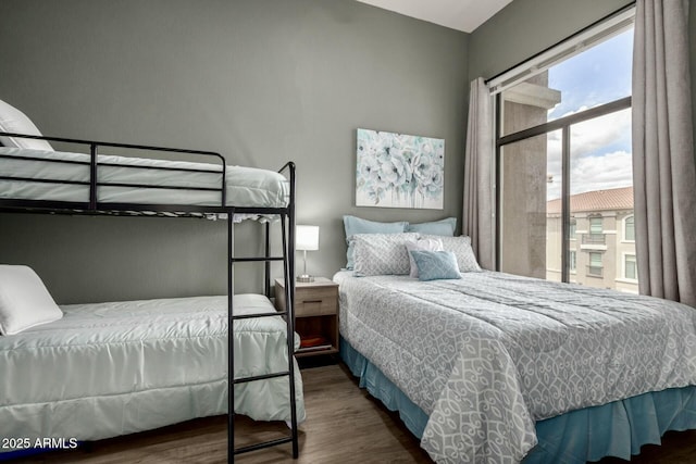 bedroom featuring wood finished floors