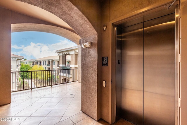 exterior space featuring elevator and a residential view