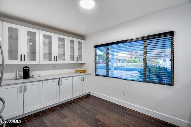 interior space featuring white cabinets