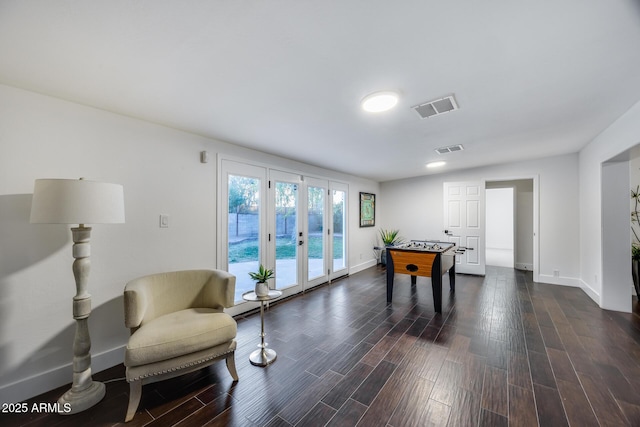 game room featuring dark wood-type flooring and french doors