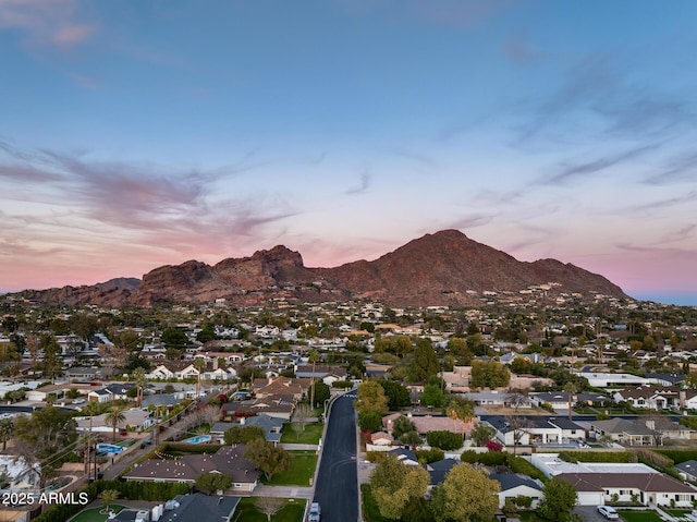 aerial view at dusk with a mountain view