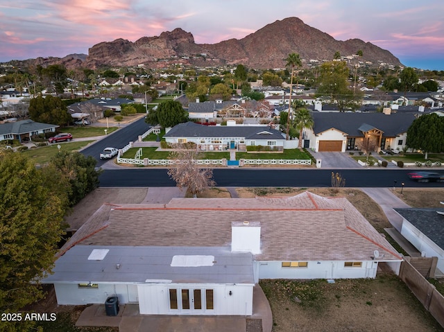 aerial view at dusk with a mountain view