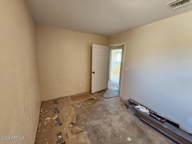 spare room featuring visible vents